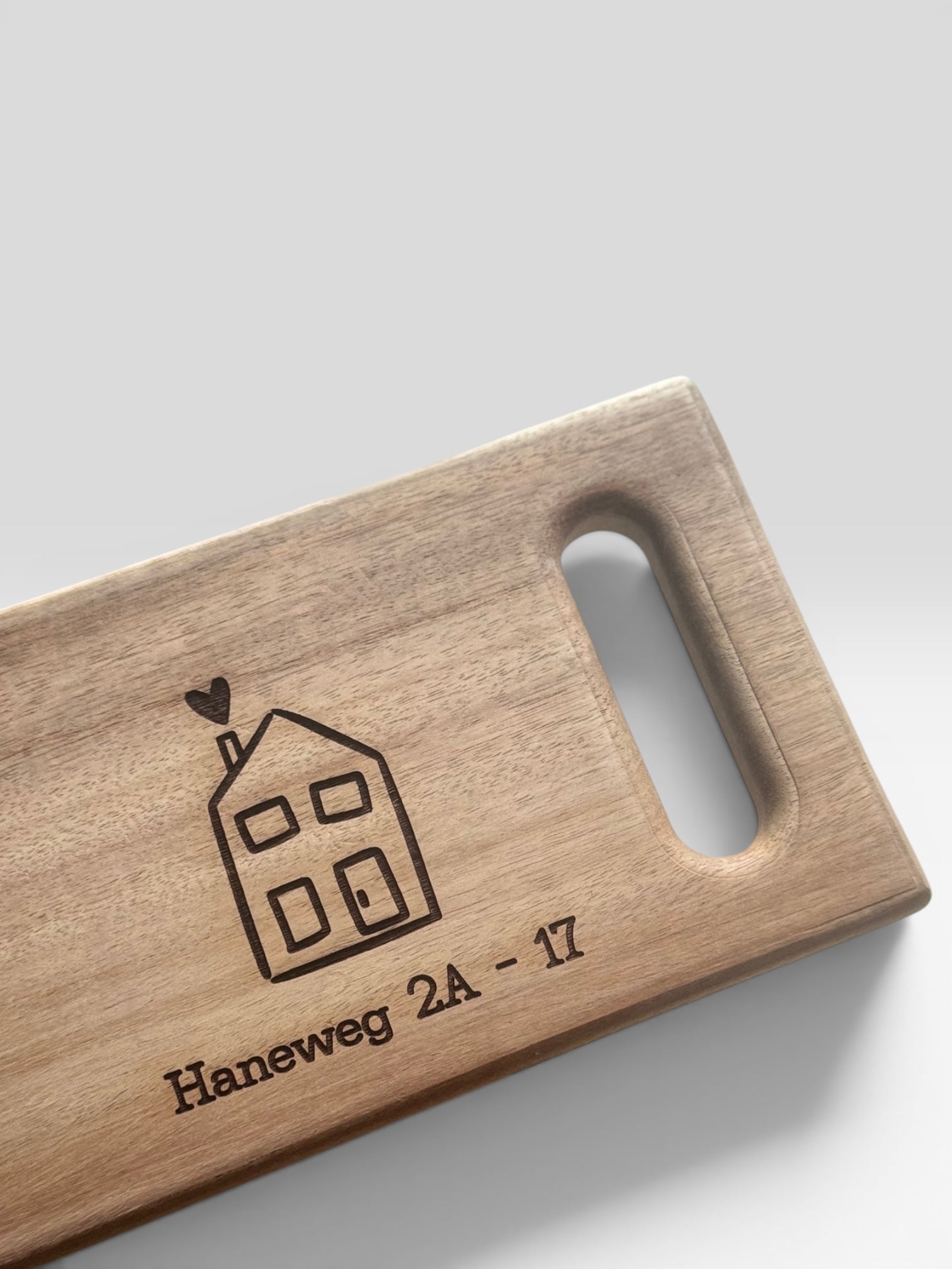 Borrelplank ‘nieuwe woning gepersonaliseerd met adres’
