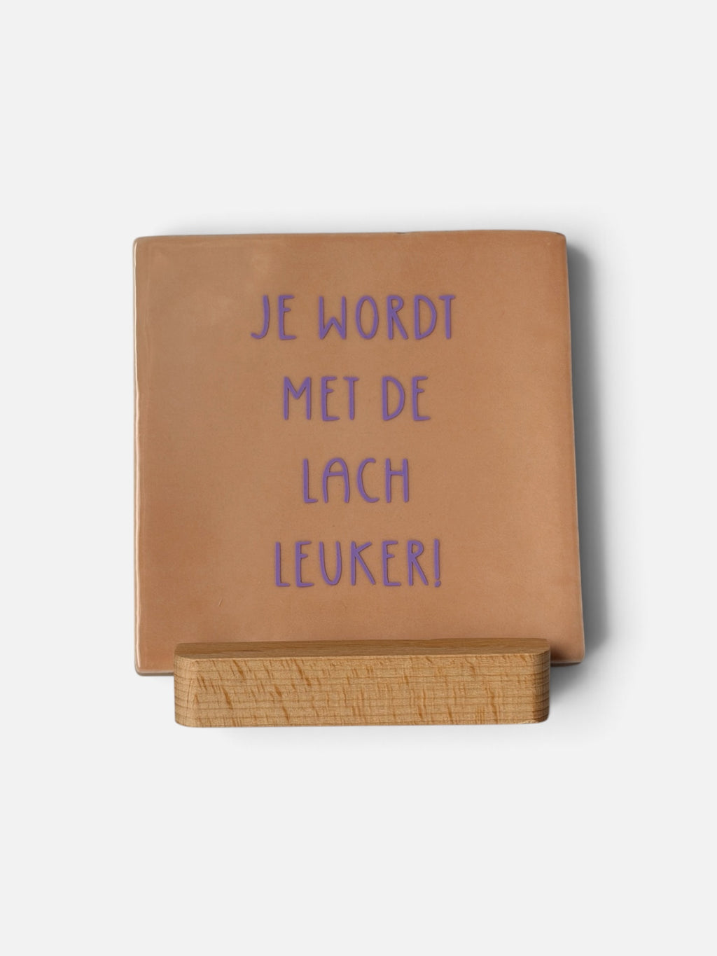 Tegeltje 'je wordt met de lach leuker’